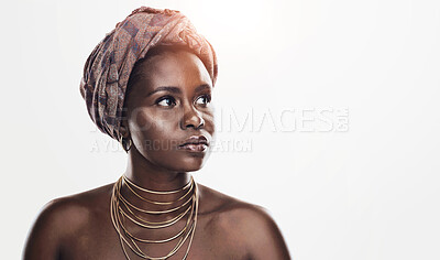 Buy stock photo Beauty, culture and black woman in studio with wrap, inspiration and natural glow on mockup. Pride, confidence and African girl with traditional makeup, unique identity and scarf on white background