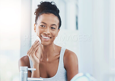 Buy stock photo Black woman, smile and skincare in mirror with cotton pads for routine at home. Natural, beauty and happy with confidence for transformation, facial and skin treatment in bathroom and satisfied