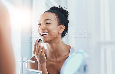 Buy stock photo Mirror, lipstick and happy woman in home with makeup for beauty, morning routine or date preparation. Reflection, smile and person apply lipgloss product for cosmetics, skin and laughing in bathroom