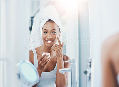 Buy stock photo Face cream, happy woman and mirror for skincare in bathroom or home for foundation, glow or natural shine. Facial lotion, model or female person with cosmetics, towel or vitamin c for beauty results