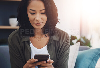 Buy stock photo Chat, woman and smartphone on couch for social media, reading or relax for internet in home. Blog, smile and female person in living room or lounge for connection, scroll or mobile app for networking