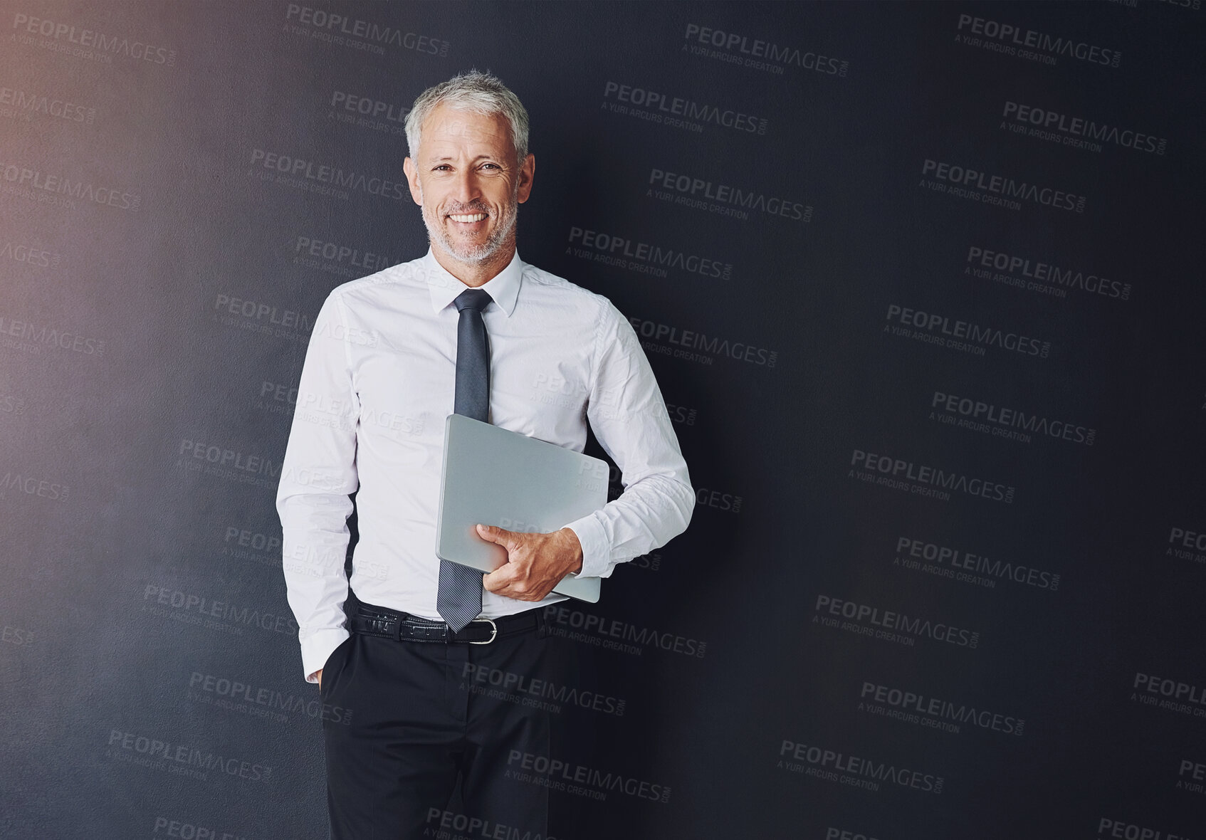 Buy stock photo Mature businessman, laptop and space in studio for mockup with smile, pride or portrait in corporate career. Person, executive or actuary with computer, happy and job at insurance agency in Australia