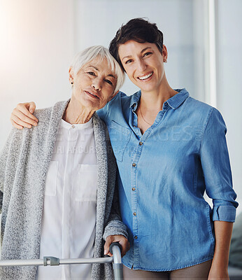 Buy stock photo Portrait, woman and elderly mother with walker, smile and embrace on visit to nursing home. Caregiver, daughter and happy mom with disability for support, health and wellness in senior care together