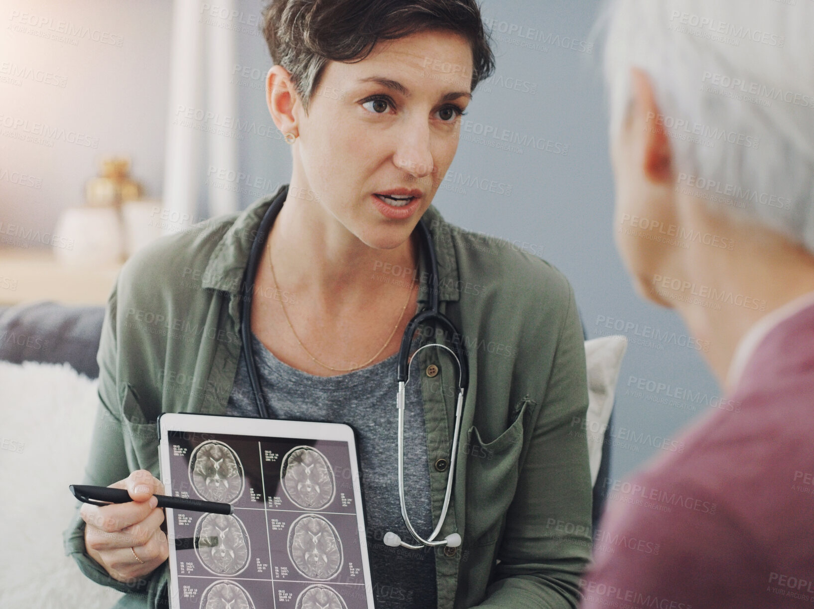 Buy stock photo Senior woman, doctor and brain scan with tablet, xray and MRI results in hospital with surgery planning. Healthcare, CT and anatomy analysis for dementia test with talk and wellness consultation