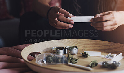 Buy stock photo Person, hands and rolling weed for blunt in house, cannabis and prepare joint for smoking. Herbal pharmaceutical, 420 and hallucinogenic in marijuana, holistic and stress relief for mental health