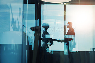 Buy stock photo Silhouette, woman and man with handshake in office for meeting, b2b interview or onboarding opportunity. Agreement, deal and business people shaking hands in welcome, introduction or partnership