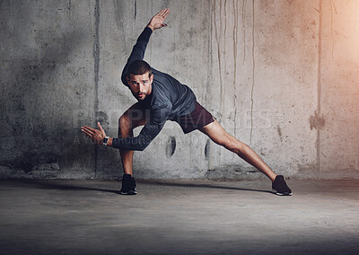 Buy stock photo Fitness, stretching and portrait of man at wall for sprint, intense exercise and commitment to sport. Male athlete, wellness and prepare for run for cardio, leg muscle development and determination