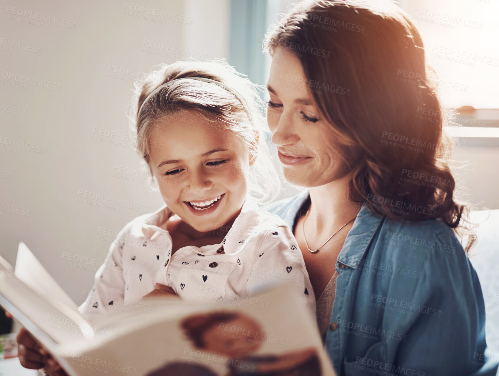 Buy stock photo Mother, girl and excited with storytelling in home for fairytale, child development and education. Family, parent and kid with smile with learning on book reading for knowledge and information