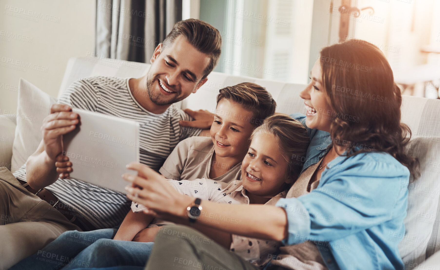 Buy stock photo Parents, kids and happy with tablet on sofa for education games, cartoon and entertainment. People, family and smile on couch in living room with fun videos for child or brain development and growth