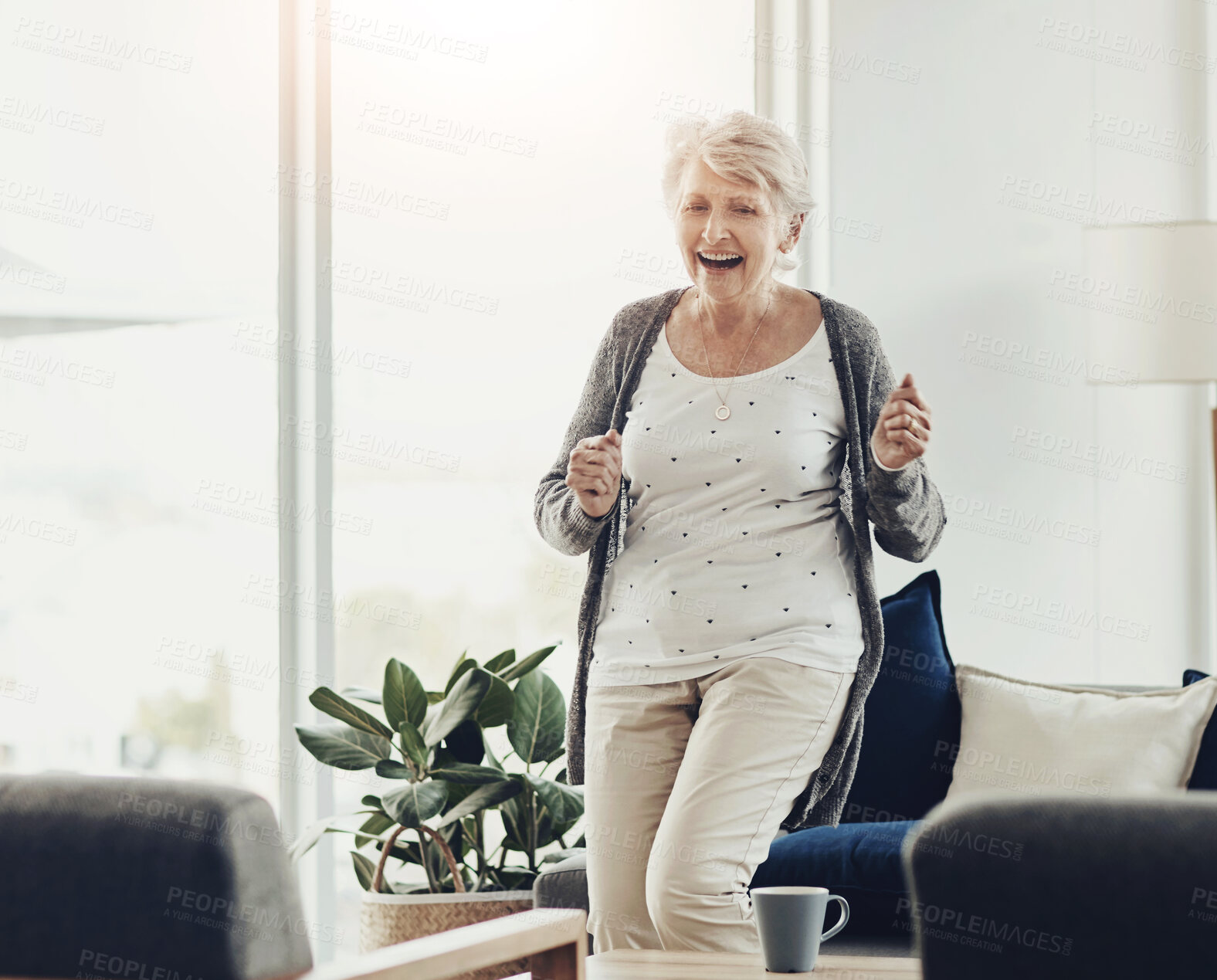 Buy stock photo Senior woman, happy and dancing in living room with music, radio and smile in retirement home. Relax, laughing and listening in a lounge with audio, fun and excited from movement and mobility