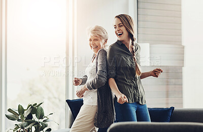 Buy stock photo Dance, senior woman and daughter with celebration in house, happiness and time together. Family, girl and mama with energy, movement and hobby with wellness, healthy and stress relief in living room