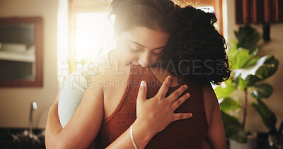 Buy stock photo Lgbtq, couple and hug with love in home for romantic relationship, connection and affection with happiness. Woman, bonding and commitment in house for queer partnership, pride and embrace with care