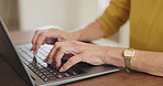 Senior hands, laptop and typing at table, working or download on Internet for retirement budget. Person, fingers and computer at desk for online research, email plan for financial wellness at home