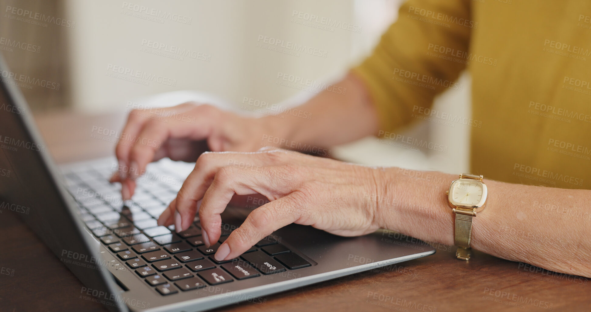 Buy stock photo Senior hands, laptop and typing at table, working or download on Internet for retirement budget. Person, fingers and computer at desk for online research, email plan for financial wellness at home