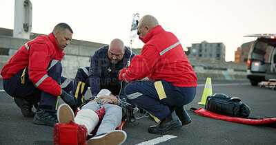 Buy stock photo People, paramedic and help patient in road on scene for emergency, rescue and support. Emt team, healthcare and stretcher for injured person on accident with medical service, care and iv bag