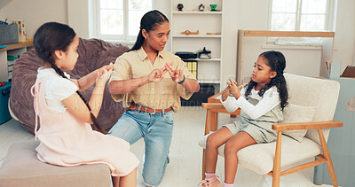 Buy stock photo Girl, children and therapist for speech therapy, communication and articulation practice for verbal disorder. Woman, kid and sign for technique or skill for vocal development, activity and exercise.