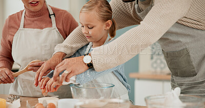 Buy stock photo Parents, child and baking with eggs for mixing ingredients, bonding or hospitality together in kitchen at home. Mother and father helping daughter, kid or little girl with mixture on dessert at house