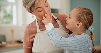 Buy stock photo Mom, girl child and cooking in kitchen for bonding in family home, parent with love and happiness. Woman, daughter and together in house for baking with play, learning and development in apartment