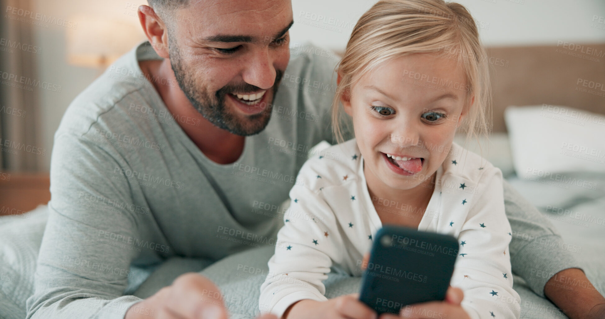 Buy stock photo Bed, funny face for selfie with father and daughter in home for bonding, communication or social media. App, silly or video call and man with girl child in bedroom of apartment for family post