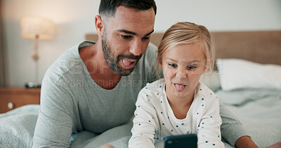 Buy stock photo Bed, funny face for selfie and dad with girl child in home for bonding, communication or social media. App, tongue or video call with with man and daughter in bedroom of apartment for communication