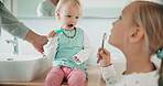 Hand, family and kids brushing teeth in bathroom for dental care, health or siblings learning oral hygiene. Sisters, parent and girl with toothbrush for cleaning, wellness and morning routine in home