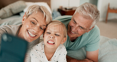 Buy stock photo Funny face, smile and selfie of kid with grandparents for happy memory, love or family bonding. Grandma, grandfather and picture of girl child for connection, care or photo together in home bedroom