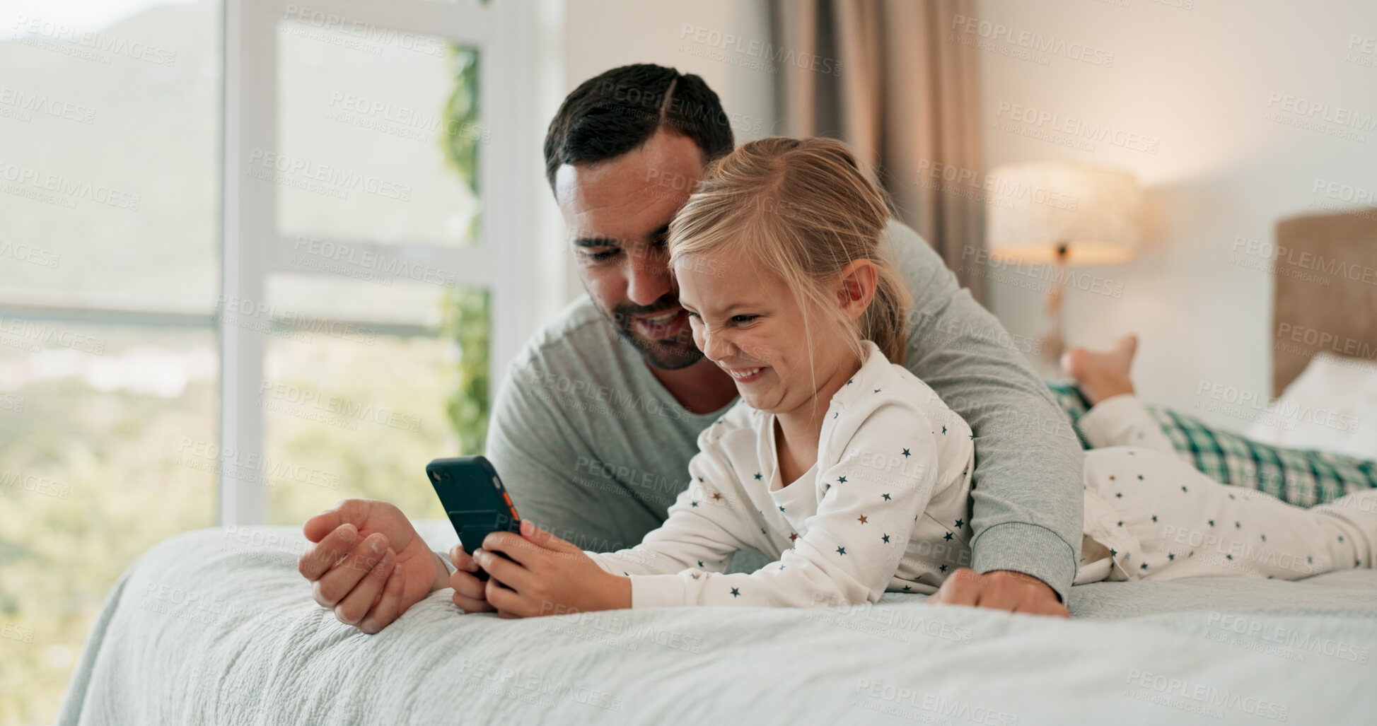 Buy stock photo Bed, funny face for selfie and dad with daughter in home for bonding, communication or social media. App, comic or video call with man and girl child playing in bedroom of apartment for communication