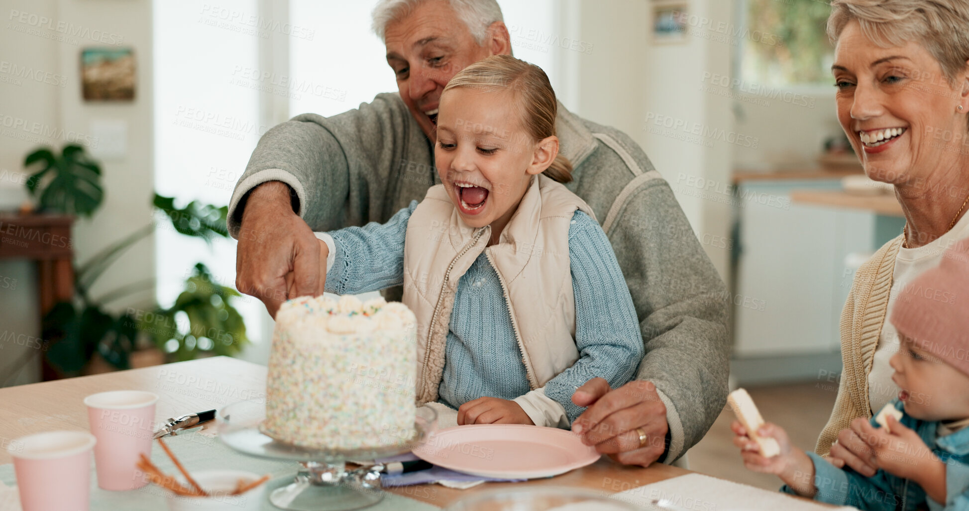 Buy stock photo Happy grandparents, child and birthday with cake for celebration or dessert together on dining table at home. Excited grandpa, grandma and young grandchild with smile for party, childhood or bonding