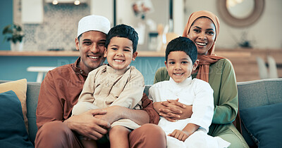 Buy stock photo Muslim family, happy and portrait on sofa in home, together and smile or bonding with children. Hijab mother, eid tradition and clothing in living room, twin siblings and islamic father on couch