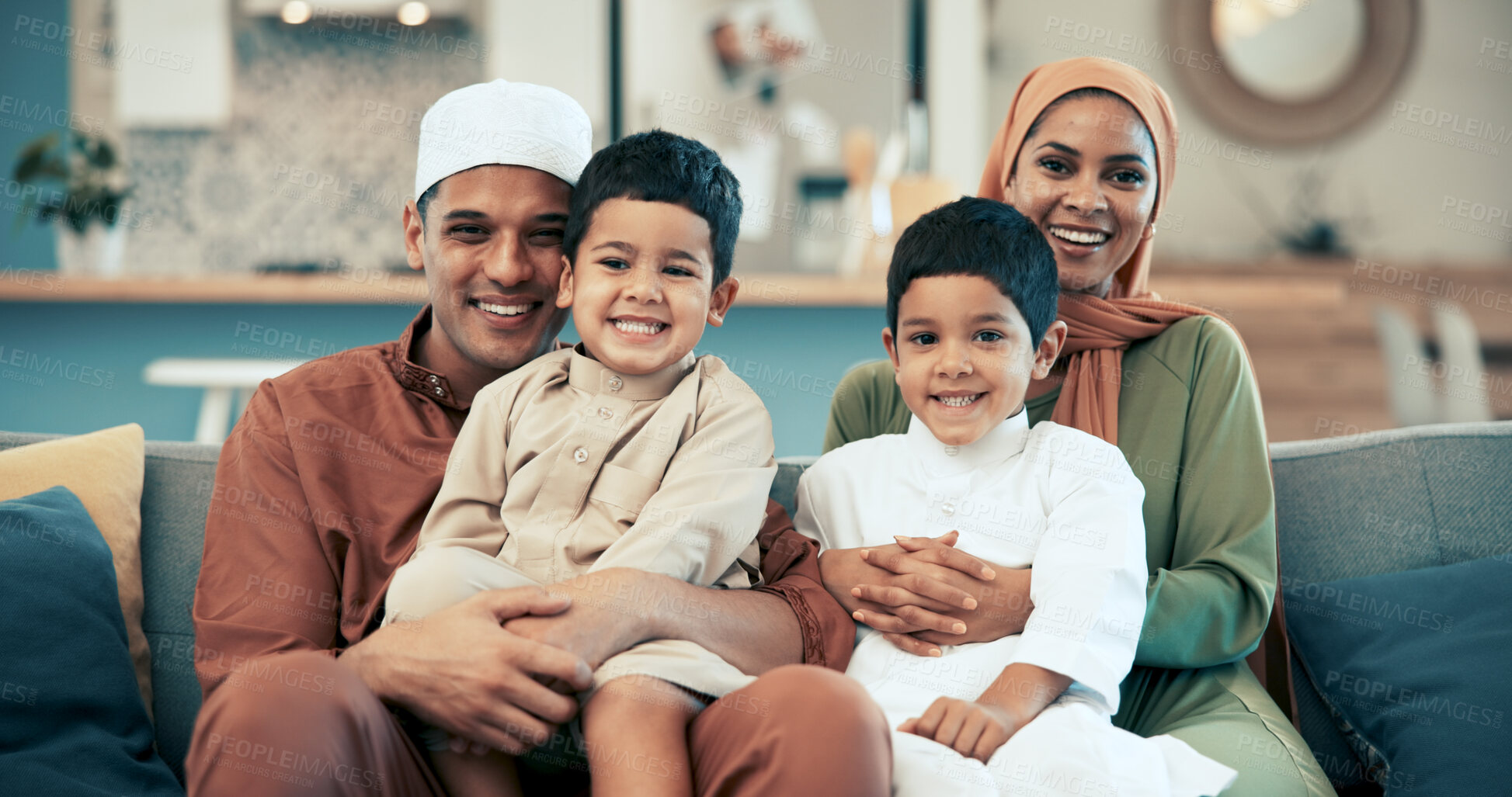 Buy stock photo Muslim family, happy and portrait on sofa in home, together and smile or bonding with children. Hijab mother, eid tradition and clothing in living room, twin siblings and islamic father on couch