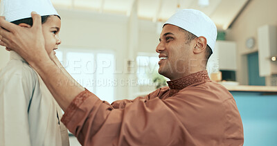 Buy stock photo Muslim family, father and son dressing in home, happy and prayer preparation in Islamic clothes. Man, help and taqiyah adjustment for salaah support, care and Malaysian people in apartment together