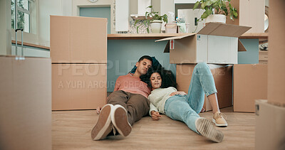 Buy stock photo Couple, boxes and sleeping on floor in new house with fatigue from travel, immigration and real estate investment. People, man and woman with rest, tired and relax together for moving to dream home