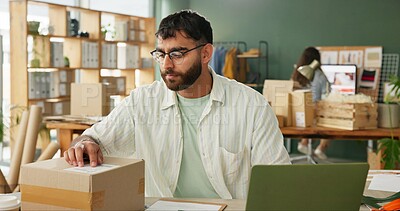 Buy stock photo Tailor, box and laptop in small business for inventory check, order and stock. Shipping package, computer and man at ecommerce startup for fashion delivery logistics with retail seller reading label