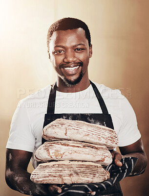 Buy stock photo African man, portrait and bread in bakery as small business or entrepreneur with confidence or pride. Male person, pastry chef and smile in kitchen with fresh sourdough loaf at restaurant in Namibia