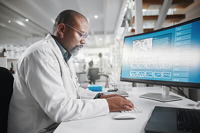 Buy stock photo Computer screen, science and typing with man in laboratory for medical or pharmaceutical research. Desktop, innovation and report with African scientist at work for analysis, development or info