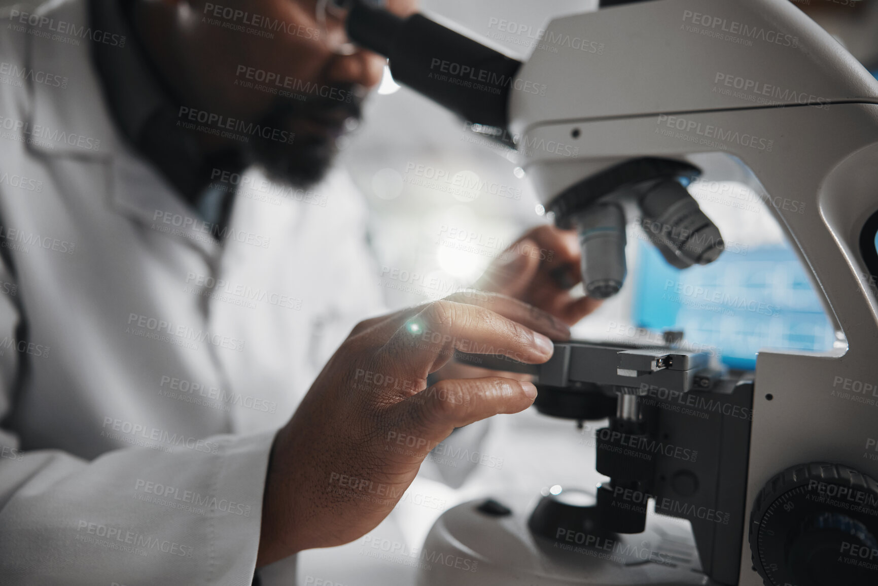 Buy stock photo Hands, scientist and microscope in laboratory for analysis, innovation and medical research. Development, technology and professional man or expert in clinic for diagnosis, cure and health care