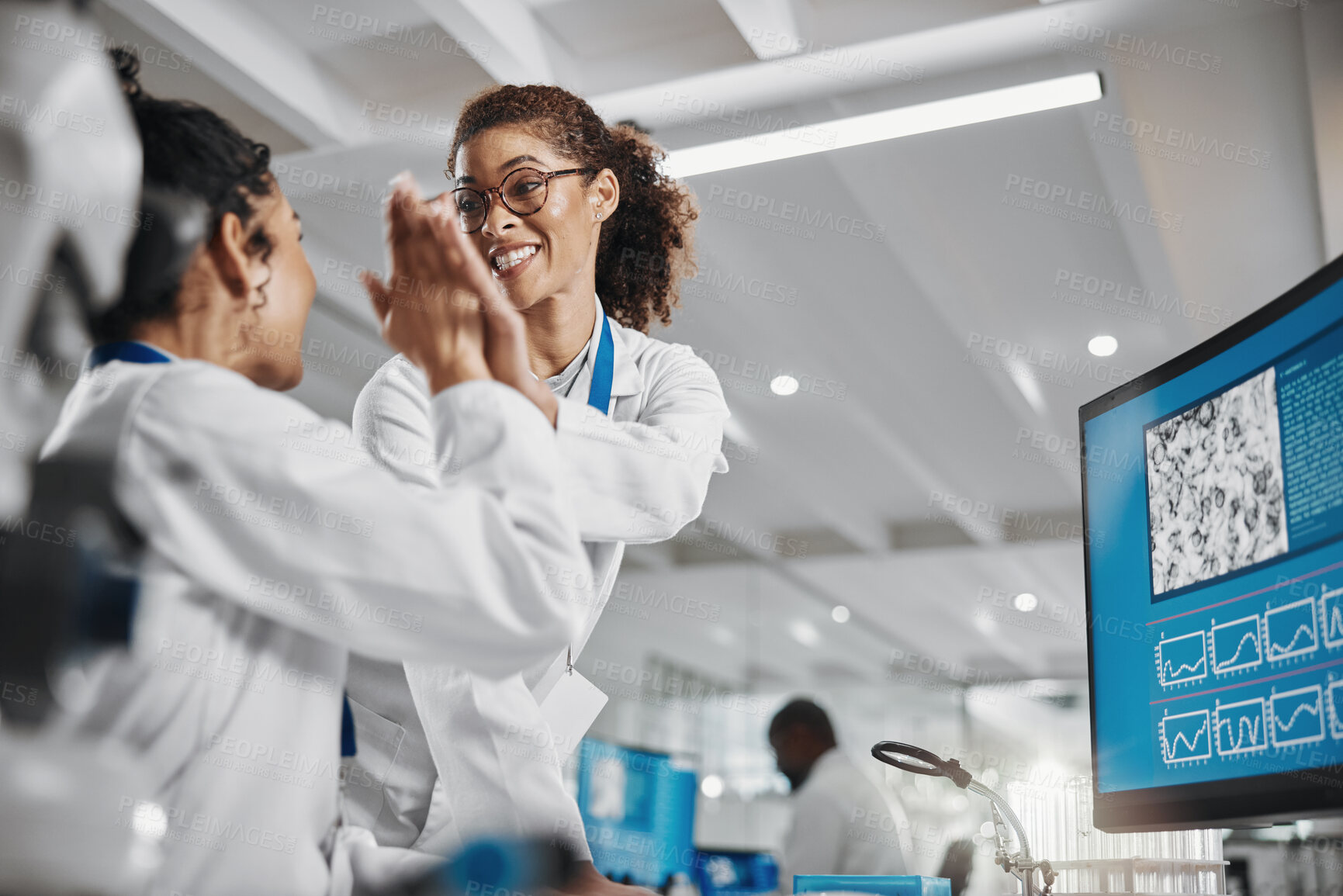 Buy stock photo Computer, teamwork and high five in laboratory for achievement, innovation or experiment. Collaboration, happy and women in hospital for research and success for career in medical or health care