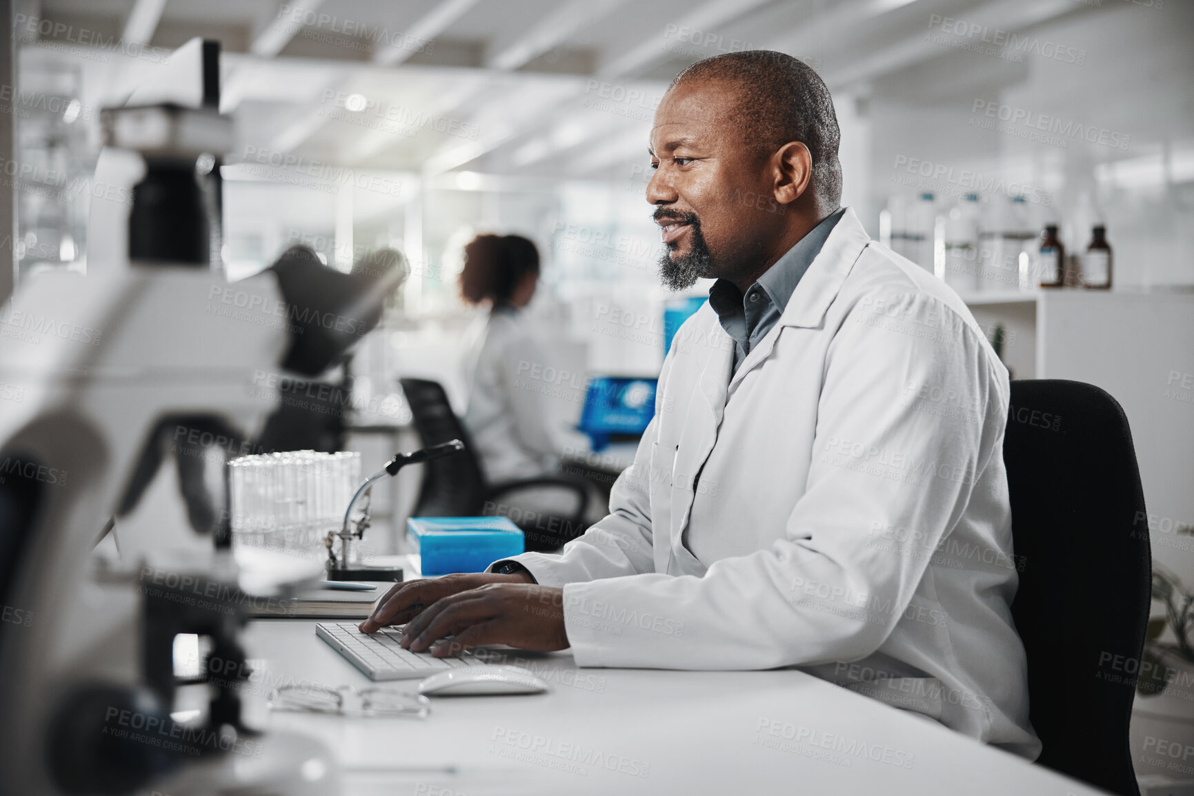 Buy stock photo Science, lab and research with black man and computer for microscope data analysis and report. Working, scientist and medical journal study with technology and professional with healthcare article