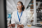 Chemical, computer and science with woman in laboratory for medical or pharmaceutical research. Innovation, study and typing with scientist at work for analysis, development or experiment report