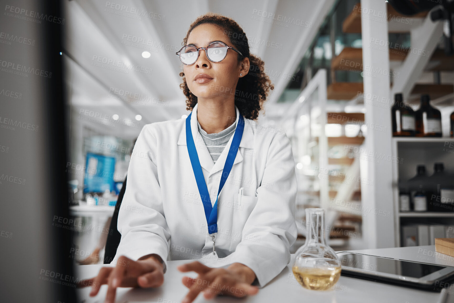 Buy stock photo Chemical, computer and science with woman in laboratory for medical or pharmaceutical research. Innovation, study and typing with scientist at work for analysis, development or experiment report