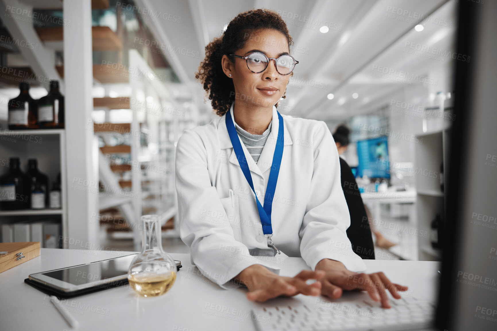 Buy stock photo Chemistry, laptop and science with woman in laboratory for medical or pharmaceutical research. Computer, innovation and typing with scientist at work for analysis, development or experiment results