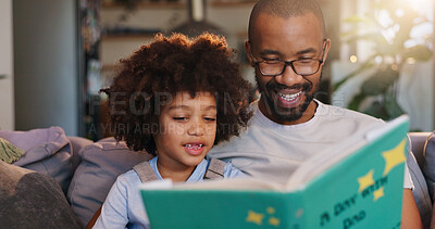 Buy stock photo African father, boy and reading with story on sofa, listening and bonding in morning at family house. Man, son and together with book, happy and relax with love, literature and learning in apartment