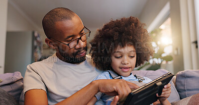 Buy stock photo Home, dad and boy with tablet on sofa on educational games for learning and entertainment. People, parent and kid on couch in living room with smile for ebooks and streaming platform for cartoons