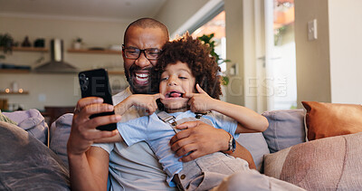 Buy stock photo Selfie, picture and father with funny face on sofa, smile and funny for social media comedy. Photography, memories and dad with child in home living room, bonding and happy for goofy fun with family