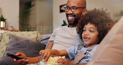 Buy stock photo Father, boy and happy with television or popcorn on sofa in living room for movies, cartoon and entertainment. People, parent and smile with kid at home for streaming platform with child development