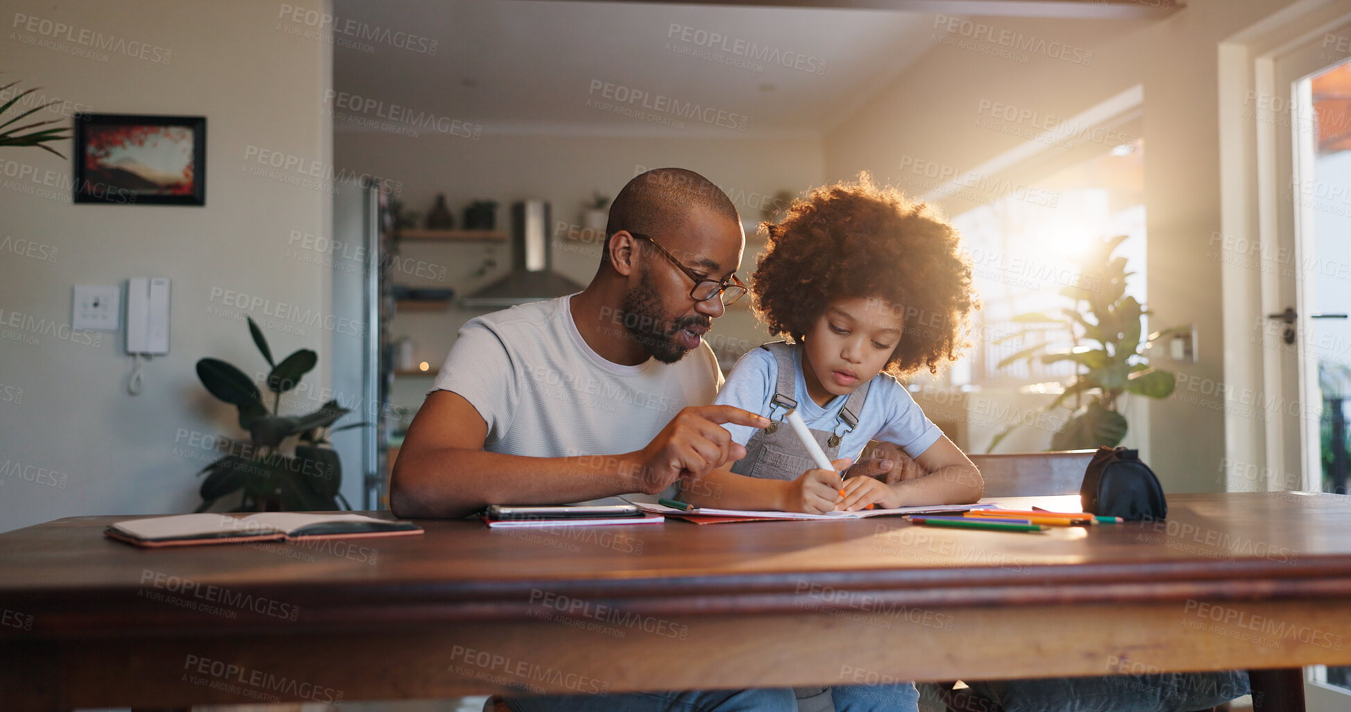 Buy stock photo African man, child and homework book with helping hand, check and guide for progress in family house. Learning, father and son with support, care and notebook for education at apartment in Chicago