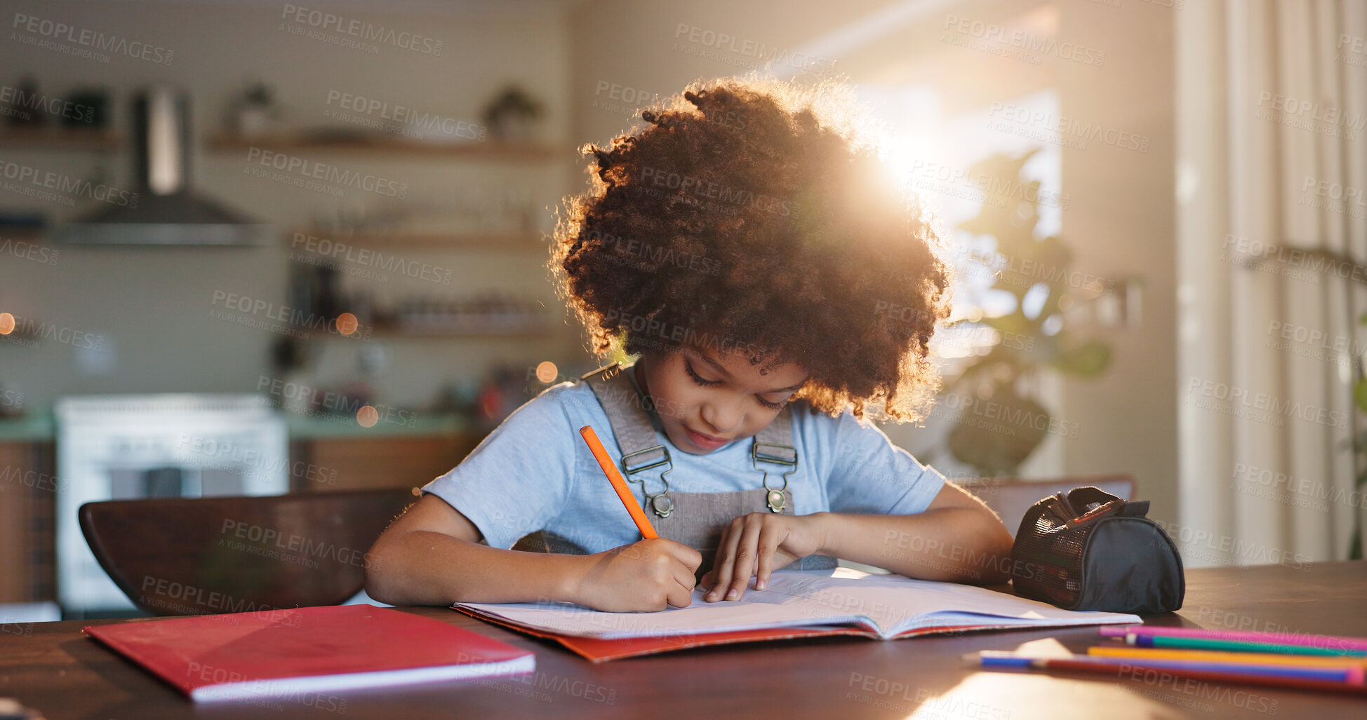Buy stock photo Boy, home and writing homework on table in house, education and school work with kid or notebook. Child development, growth and studying for test or exam, apartment and academic knowledge with pen