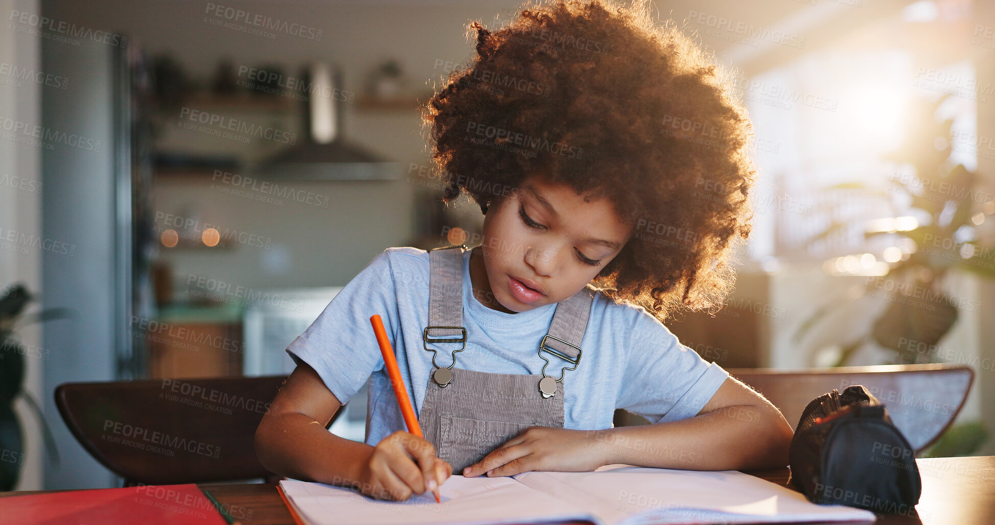 Buy stock photo Boy, home and writing homework on table in house, education and school work with kid or notebook. Child development, growth and studying for test or exam, apartment and academic knowledge with pen