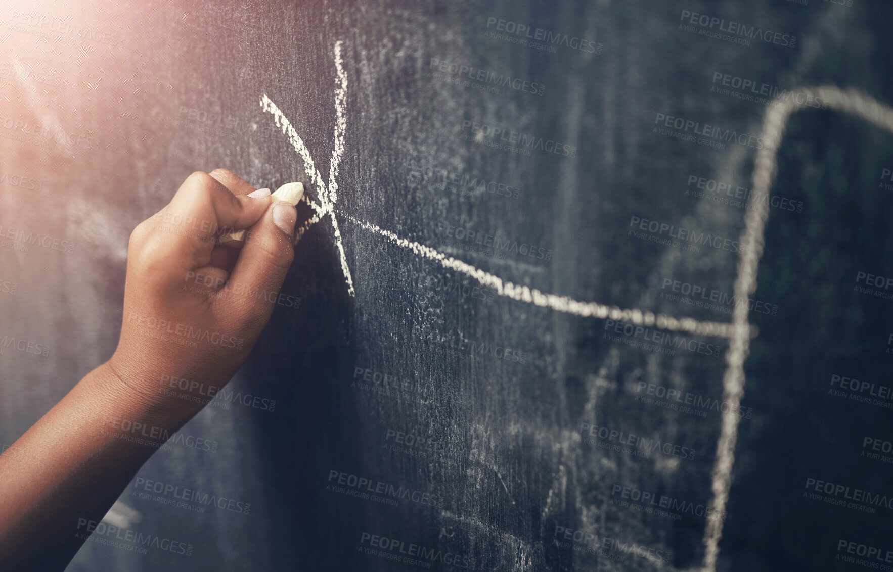 Buy stock photo Cropped shot of a young boy writing on a blackboard at home