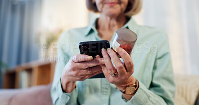 Buy stock photo Hands, pills and elderly woman with phone for healthcare website, advice and research on medicine. Retirement home, telehealth and person with container for side effects, dosage and label information